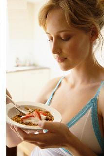 women eating cereal